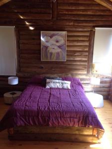 Una cama o camas en una habitación de Leben Haus Cabañas