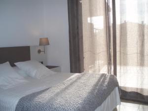 Posteľ alebo postele v izbe v ubytovaní Casa bonmont con vistas al mar piscina y port aventura