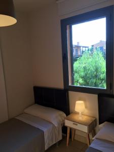 Posteľ alebo postele v izbe v ubytovaní Casa bonmont con vistas al mar piscina y port aventura