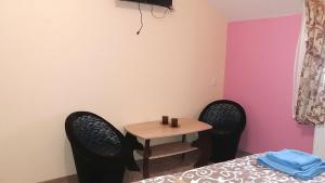 Postel nebo postele na pokoji v ubytování Hotel