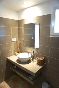 a bathroom with a sink and a mirror at Lone Star House in Sainte-Maxime +37 photos