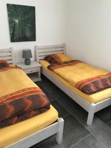 Postel nebo postele na pokoji v ubytování Apartment D'Uval