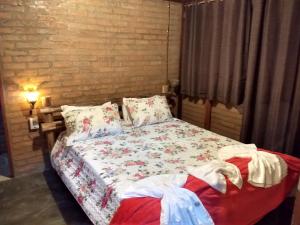 Katil atau katil-katil dalam bilik di Casa do Bosque