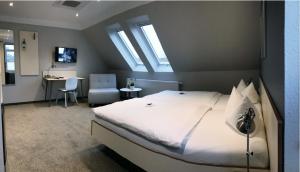 Postel nebo postele na pokoji v ubytování Hotel & Restaurant Prüser´s Gasthof