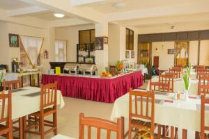 Majoituspaikan Inle Apex Hotel ravintola tai vastaava paikka