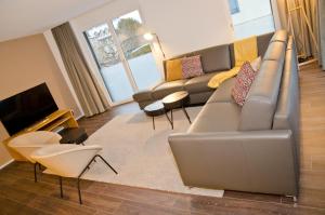 Ruang duduk di Apartment Flüehblüemli - GRIWA RENT AG