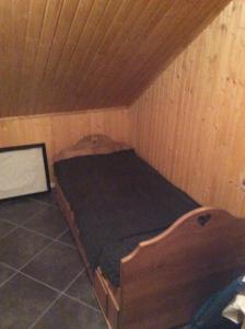Uma cama ou camas num quarto em Chata Kiki Malino Brdo