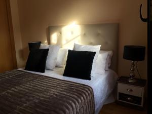 Posteľ alebo postele v izbe v ubytovaní Apartamento Conde Luna