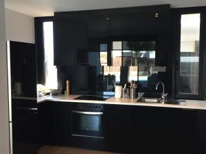 A kitchen or kitchenette at Casa de lujo frente a la playa de Es Trenc
