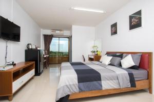 Postel nebo postele na pokoji v ubytování I-Home Residence and Hotel