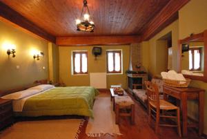 Postel nebo postele na pokoji v ubytování Guesthouse Alonistaina