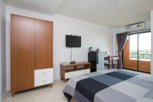 Postel nebo postele na pokoji v ubytování I-Home Residence and Hotel