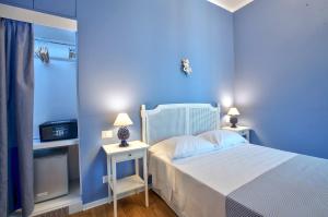 A bed or beds in a room at B&B Del Corso
