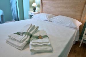A bed or beds in a room at B&B Del Corso