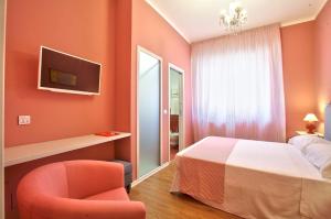 A bed or beds in a room at B&B Del Corso