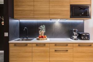 Kuchnia lub aneks kuchenny w obiekcie Apartament Czarny Staw