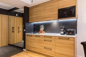 Kuchnia lub aneks kuchenny w obiekcie Apartament Czarny Staw