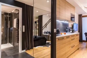 Kuchnia lub aneks kuchenny w obiekcie Apartament Czarny Staw