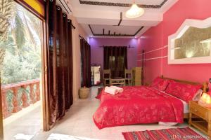 Postel nebo postele na pokoji v ubytování Kasbah Restaurant Amazir