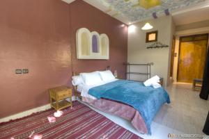 Postel nebo postele na pokoji v ubytování Kasbah Restaurant Amazir