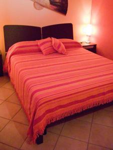 Postel nebo postele na pokoji v ubytování B&B Borgo Tre Case