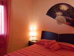 Postel nebo postele na pokoji v ubytování B&B Borgo Tre Case