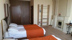 Postel nebo postele na pokoji v ubytování Baku Sea View Hotel