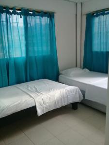 Hotel Paseo Bolivar客房内的一张或多张床位