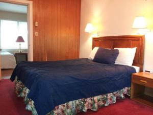 Postel nebo postele na pokoji v ubytování Ocean Avenue Inn