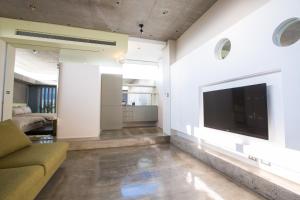 TV a/nebo společenská místnost v ubytování One Piece B&B