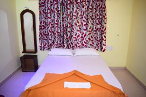 Letto o letti in una camera di Konkan Villa Dream