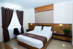 Giường trong phòng chung tại Hoa Phuong Hotel