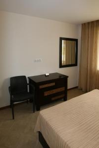 A bed or beds in a room at Private Villa 102 with heated pool in BlackSeaRama