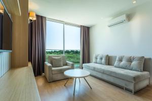 A seating area at Aska Lara Resort & Spa Hotel