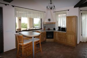 A kitchen or kitchenette at Private Villa 102 with heated pool in BlackSeaRama