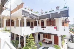 an aerial view of a house with a balcony at Angel Inn Guest House in Negombo