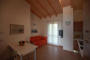 TV a/nebo společenská místnost v ubytování Agriturismo Al Franet