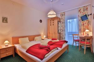 Letto o letti in una camera di Hotel Beim Winkler