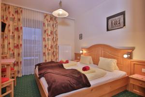 Letto o letti in una camera di Hotel Beim Winkler