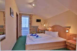 Letto o letti in una camera di Hotel Beim Winkler