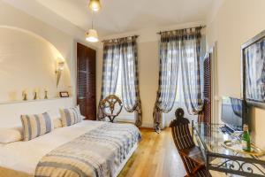 Letto o letti in una camera di Hostellerie de Genève