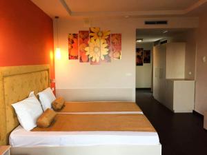 a bedroom with a bed in a room at Studio Elegance in Golden Sands +10 photos