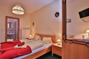 Letto o letti in una camera di Hotel Beim Winkler