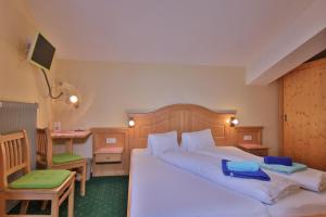 Letto o letti in una camera di Hotel Beim Winkler