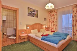 Letto o letti in una camera di Hotel Beim Winkler