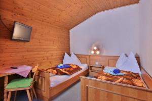 Letto o letti in una camera di Hotel Beim Winkler