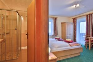 Letto o letti in una camera di Hotel Beim Winkler