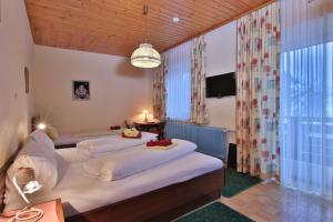 Letto o letti in una camera di Hotel Beim Winkler