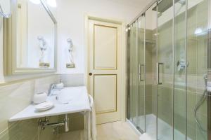 a bathroom with a sink and a shower at B&B Palazzo Montesanto in Maiori