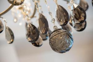 a close up of a necklace with crystals at B&B Palazzo Montesanto in Maiori